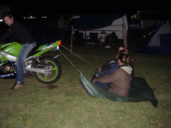 crowd is starting to form along the fence...