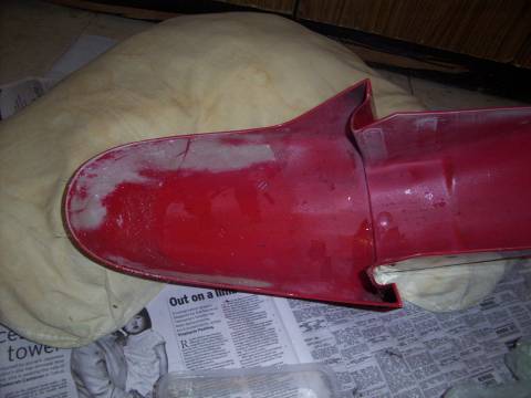 put the base resin coat on, then apply the glass and use a chopstick/skewer or something to push the glass down to et the resin thru