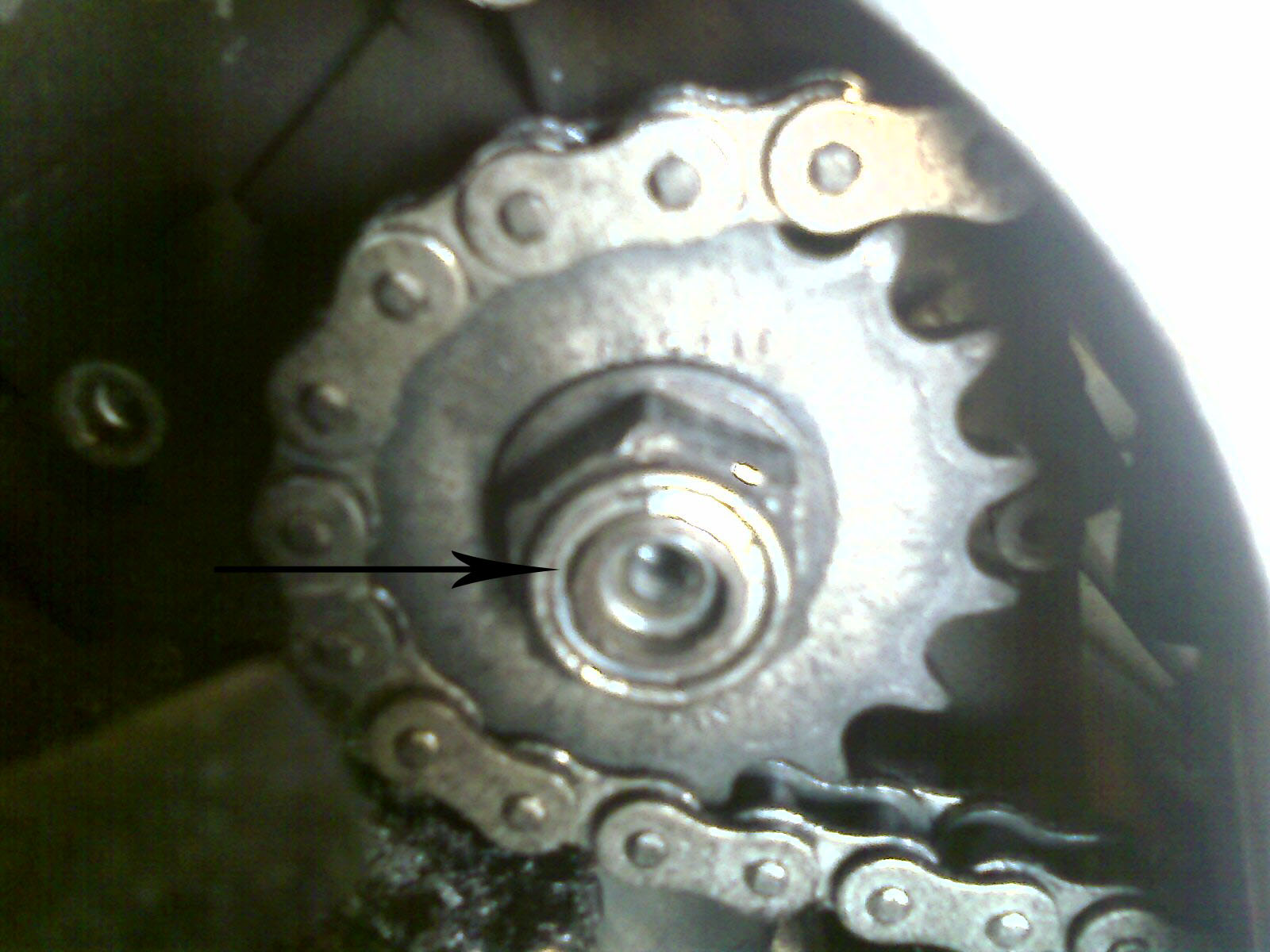 Arrow points at what I think is where I am having trouble, perhaps I need to bend/tap/slide/remove something there.... not sure