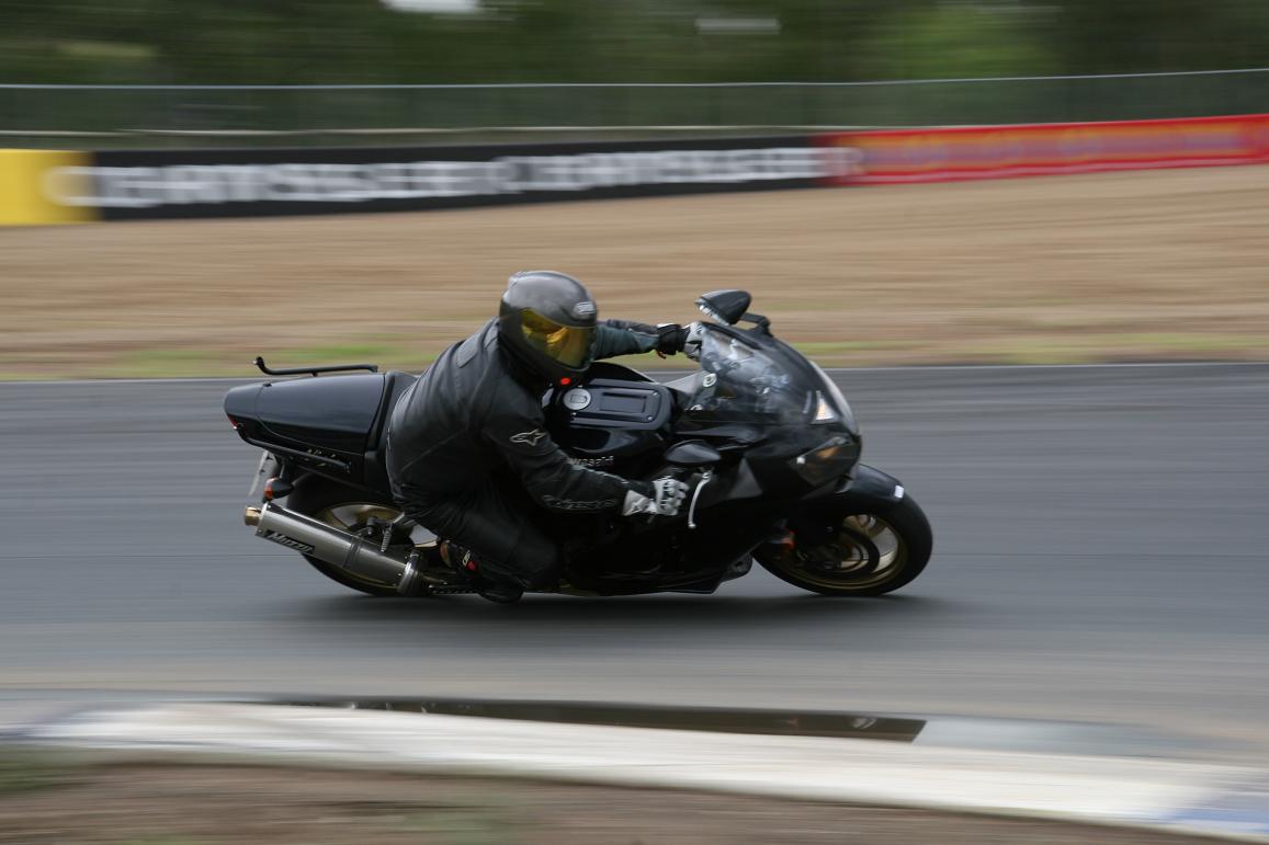 For anyone who is interested here's the full pic which I got in the mail yesterday... I reckon I'm off the seat more than it looks like, but being a midget on a wide bike it doesn't look like I've moved at all.