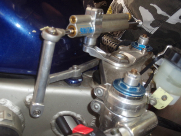 also a post connected to the tank mount which bolts into the mounting for the H bracket