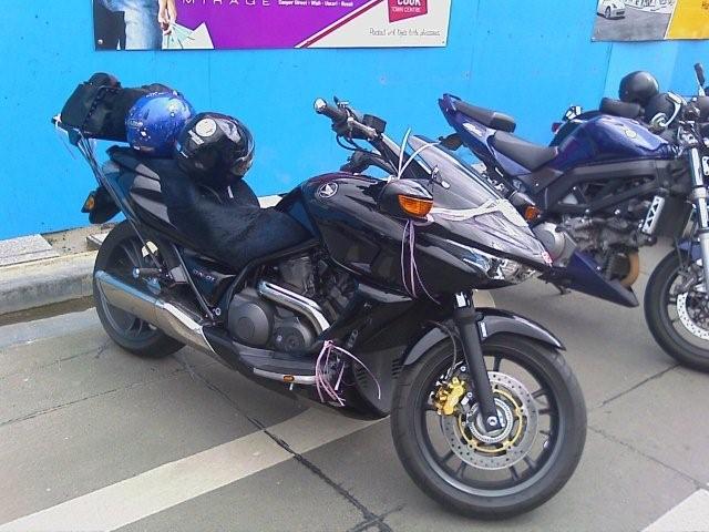 Its a scooter motorcycle hybrid... its a scootercycle! Motorscooter! Mschooterbike!