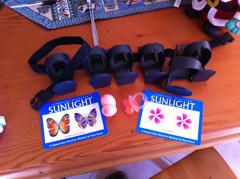 beer belt, boobie toys and stickers