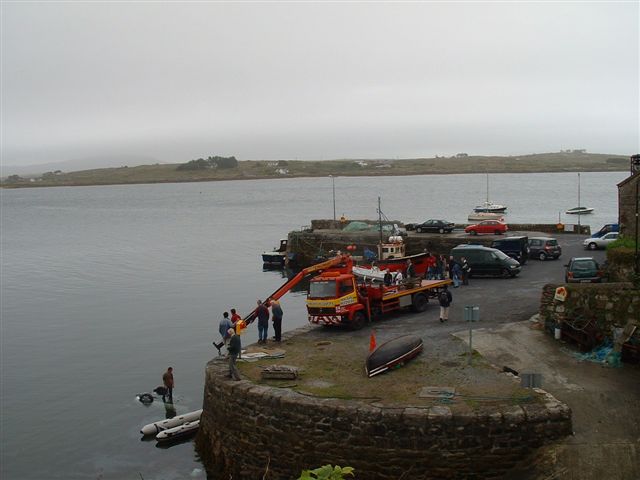 1. I could have sworn I hit the brake pedal!<br />Car upside down in the bay. See the guy standing on it??<br />Call out the crane truck!