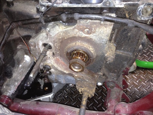 Transmission cover shows evidence of a thrown chain at some point. Fortunately replacements for most OEM parts are dirt cheap from The House of Bays
