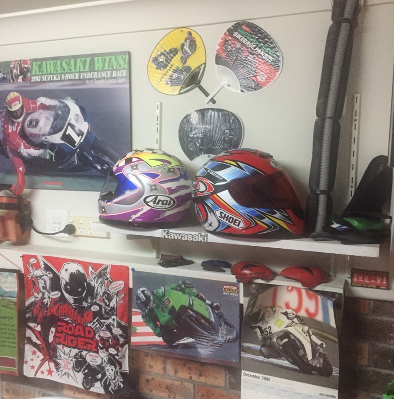 My little Suzuka 8-Hour shrine: Arai Slight bought off ebay, Shoei Katoh 2 that I mangled at PI, both obviously display only.