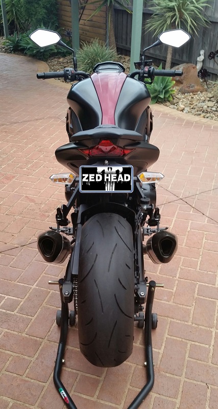 Rear shot of Akro full system - twin carbon mufflers...