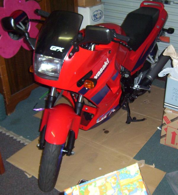 My ride!!!  Note the oil leaks on the cardboard...not happy, have to get the deal I bought from the fix under warranty...not sure of my chances though...